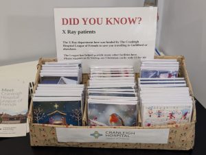 A basket filled with packets of Christmas cards