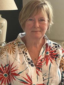 Head and shoulders of a female.