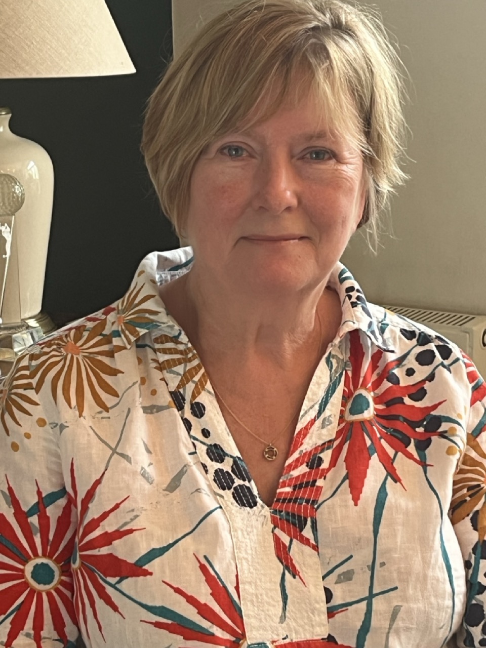 Head and shoulders of a female.