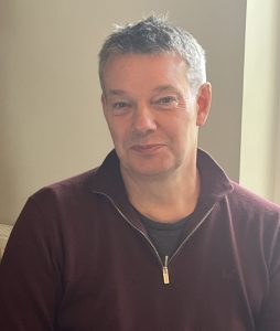 Head and shoulders photo of a man.