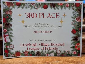 Certificate announcing third place in a Christmas Tree decorating competition.