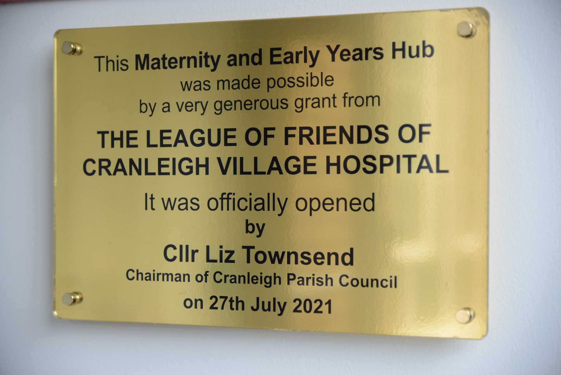 Brass plaque acknowledging a donation.